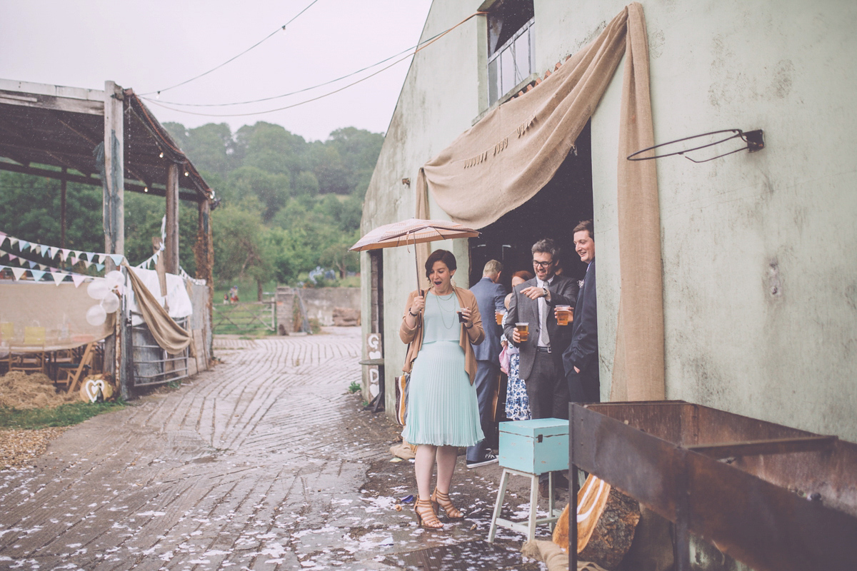 Georgie wore a 1950's inspired Essense of Australia gown for her rustic and rural Somerset barn wedding. Photography by Naomi Jane.