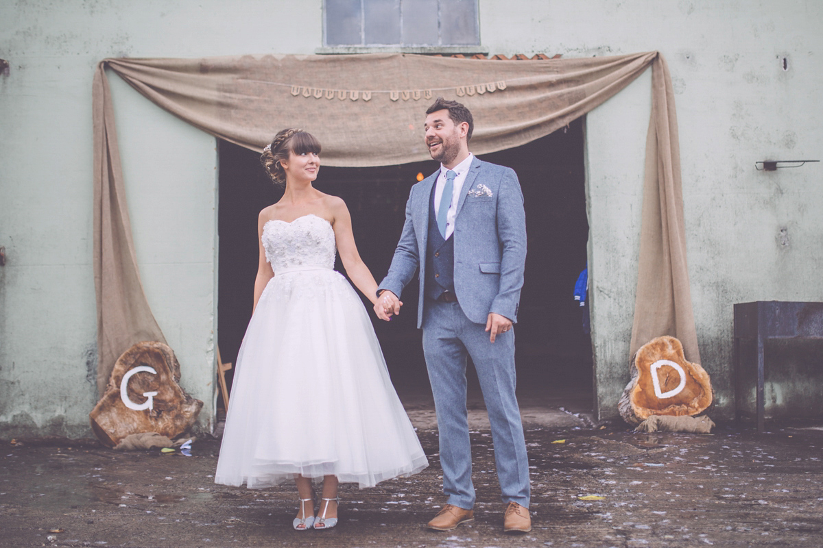 Georgie wore a 1950's inspired Essense of Australia gown for her rustic and rural Somerset barn wedding. Photography by Naomi Jane.