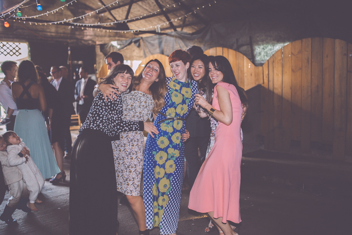 Georgie wore a 1950's inspired Essense of Australia gown for her rustic and rural Somerset barn wedding. Photography by Naomi Jane.