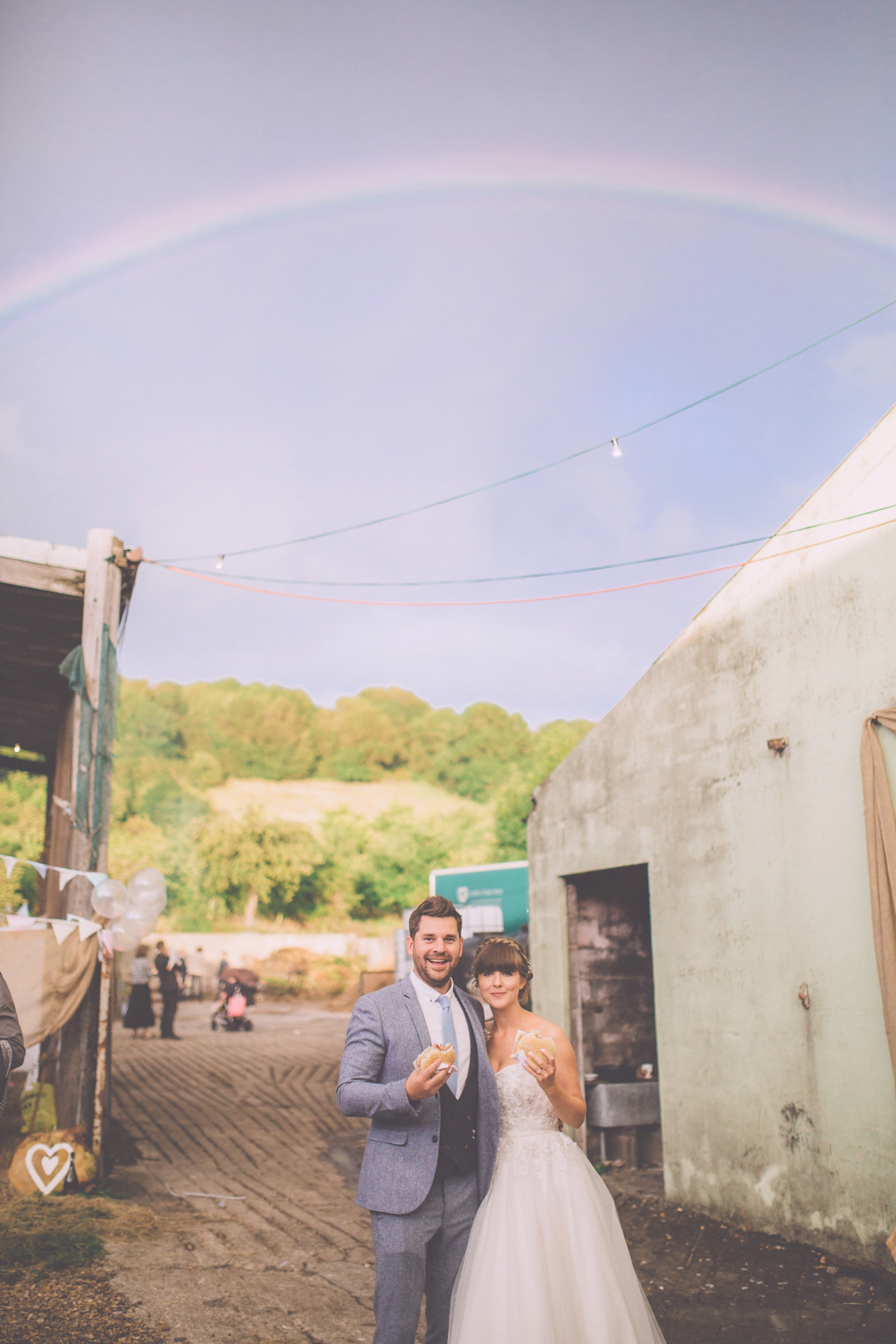 Georgie wore a 1950's inspired Essense of Australia gown for her rustic and rural Somerset barn wedding. Photography by Naomi Jane.