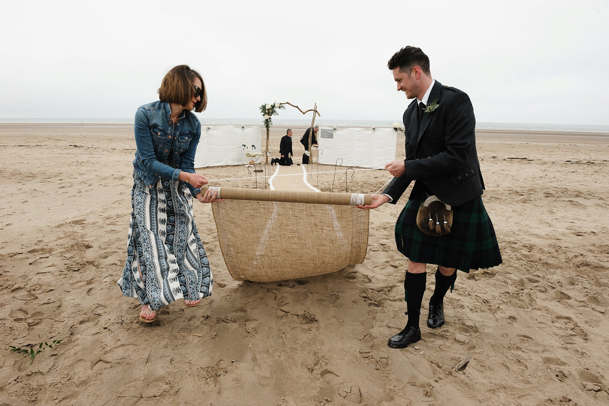 Laura wears a 1970's inspired Stone Cold Fox wedding dress for her laid back and organic beach wedding in Scotland. Photography by Tino and Pip.