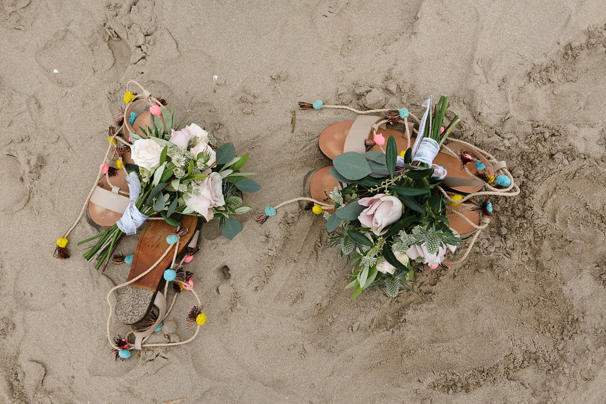 Laura wears a 1970's inspired Stone Cold Fox wedding dress for her laid back and organic beach wedding in Scotland. Photography by Tino and Pip.