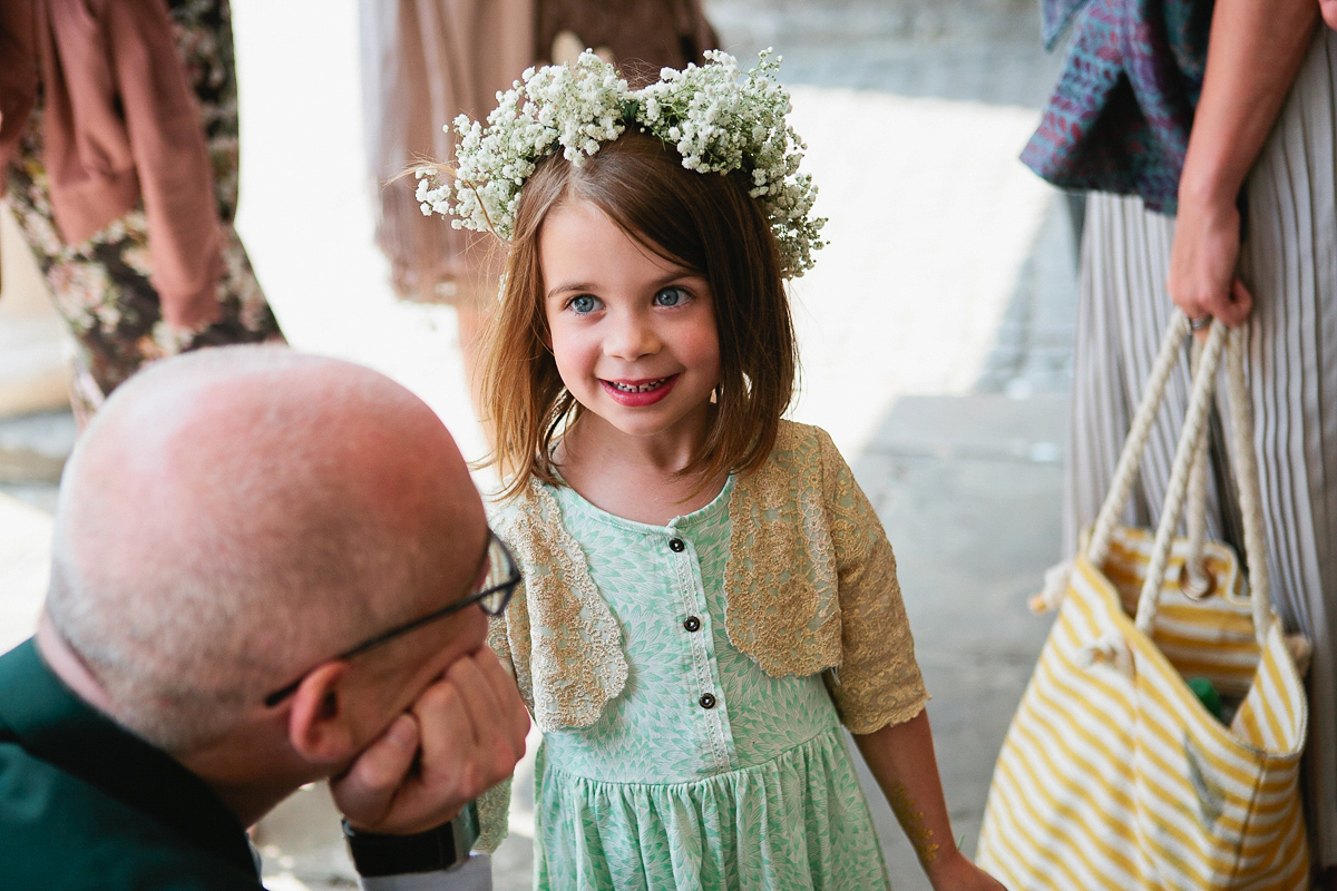 Sophie wore a Ghost dress for her elegant Spring wedding. Her bridesmaids wore mint green. Photography by Matilda Delves.