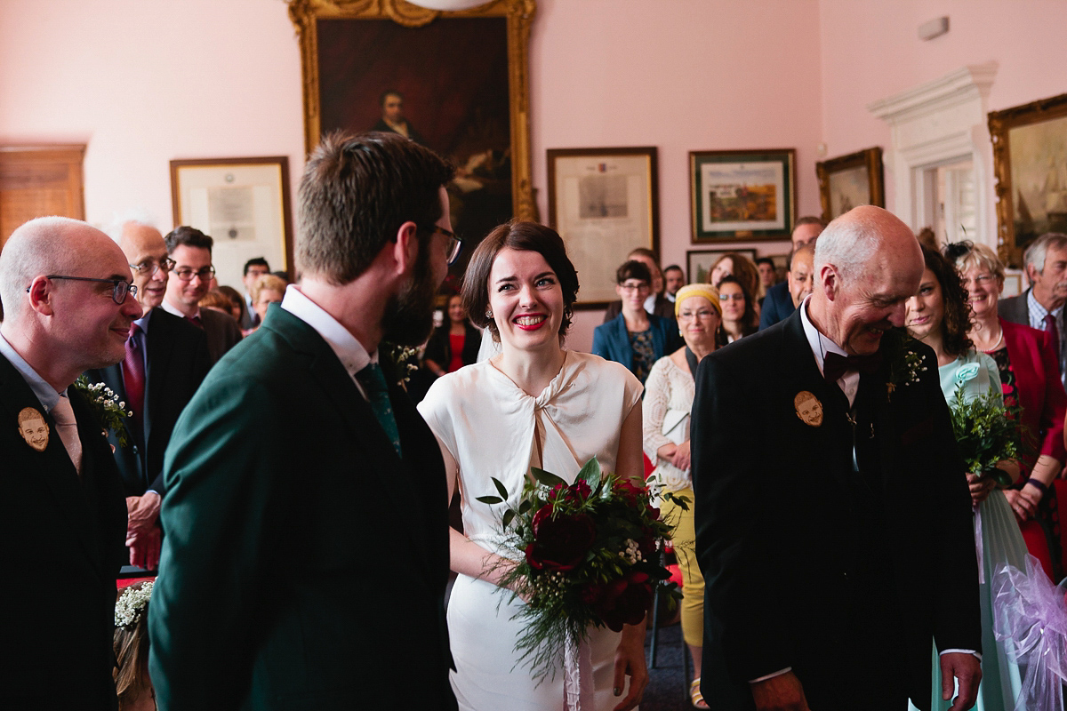 Sophie wore a Ghost dress for her elegant Spring wedding. Her bridesmaids wore mint green. Photography by Matilda Delves.