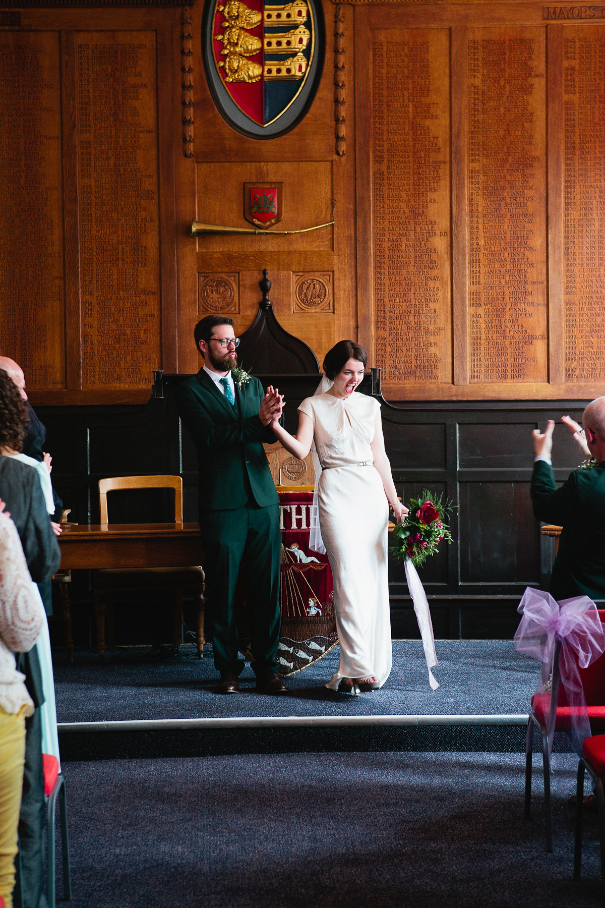 Sophie wore a Ghost dress for her elegant Spring wedding. Her bridesmaids wore mint green. Photography by Matilda Delves.