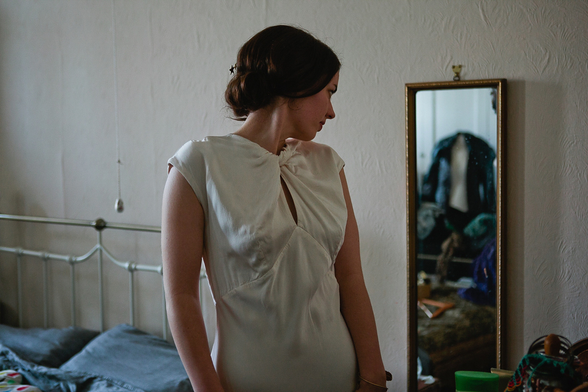 Sophie wore a Ghost dress for her elegant Spring wedding. Her bridesmaids wore mint green. Photography by Matilda Delves.