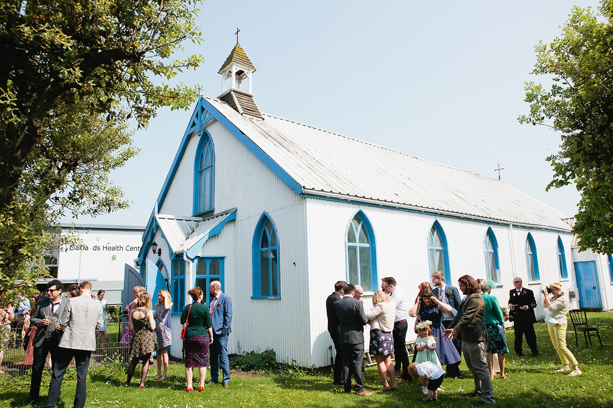 Sophie wore a Ghost dress for her elegant Spring wedding. Her bridesmaids wore mint green. Photography by Matilda Delves.