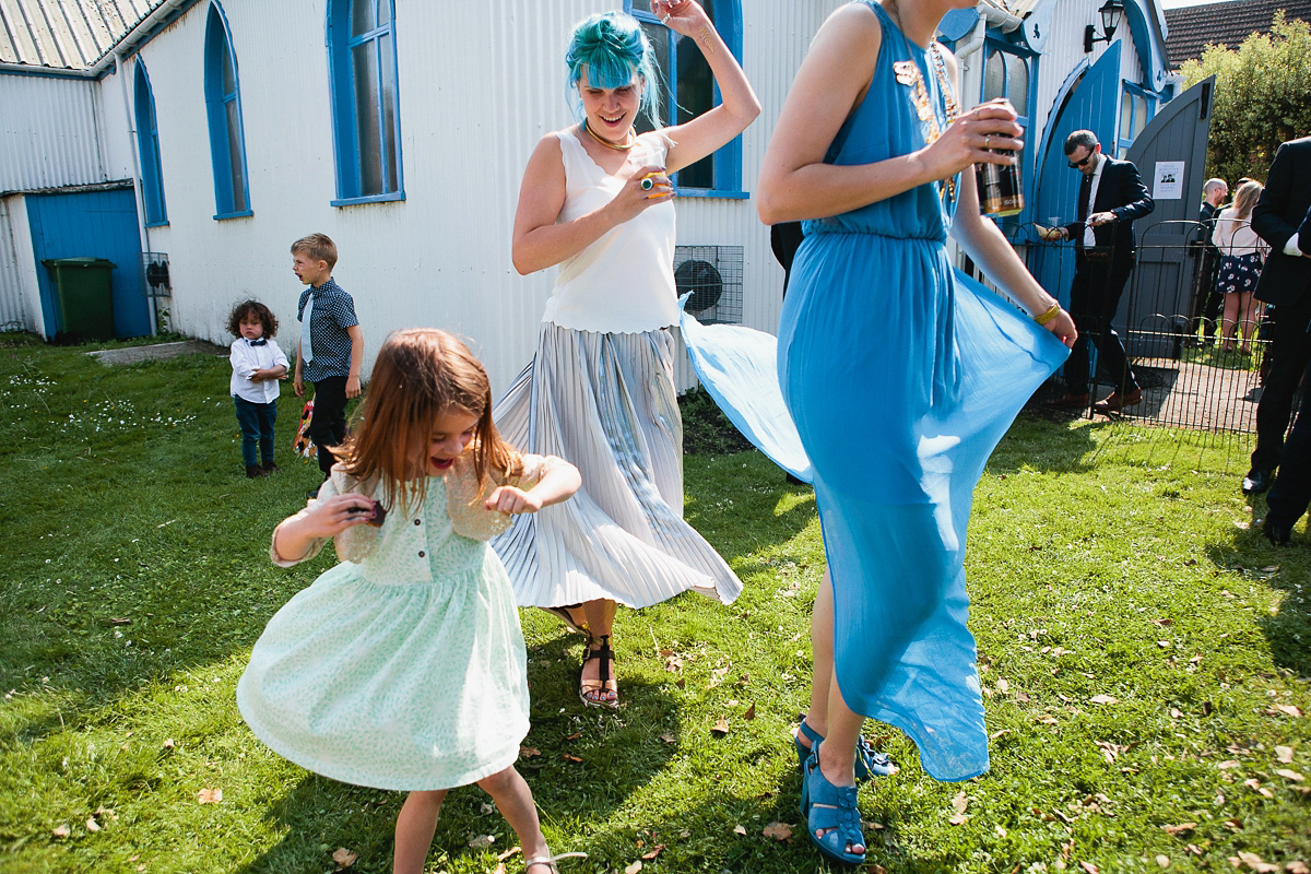 Sophie wore a Ghost dress for her elegant Spring wedding. Her bridesmaids wore mint green. Photography by Matilda Delves.