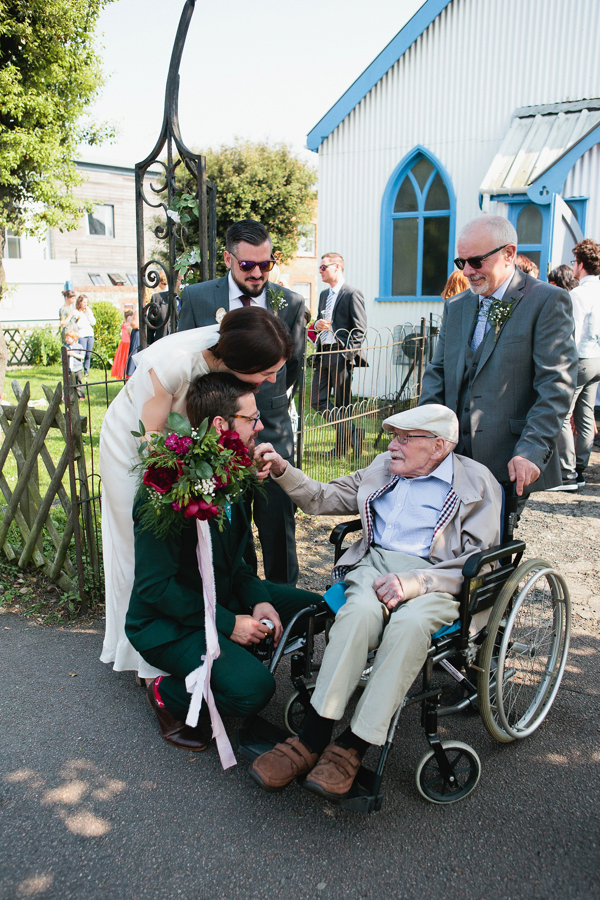 Sophie wore a Ghost dress for her elegant Spring wedding. Her bridesmaids wore mint green. Photography by Matilda Delves.