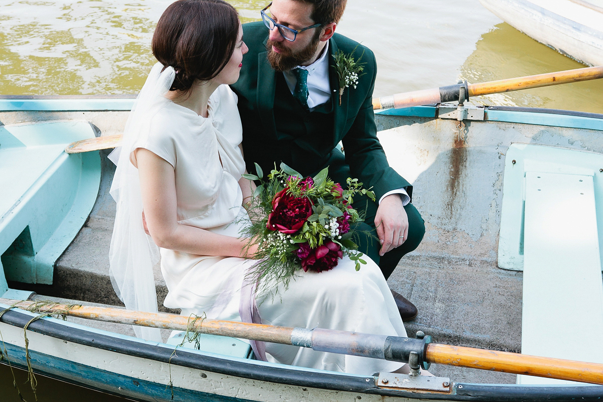 Sophie wore a Ghost dress for her elegant Spring wedding. Her bridesmaids wore mint green. Photography by Matilda Delves.