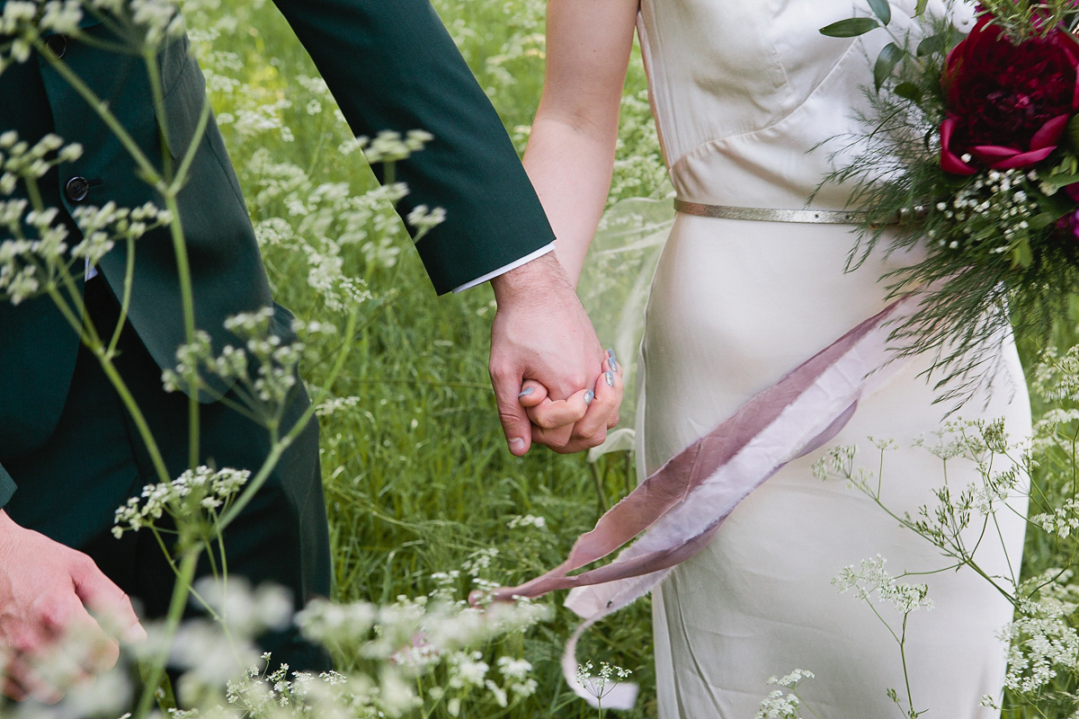 Sophie wore a Ghost dress for her elegant Spring wedding. Her bridesmaids wore mint green. Photography by Matilda Delves.