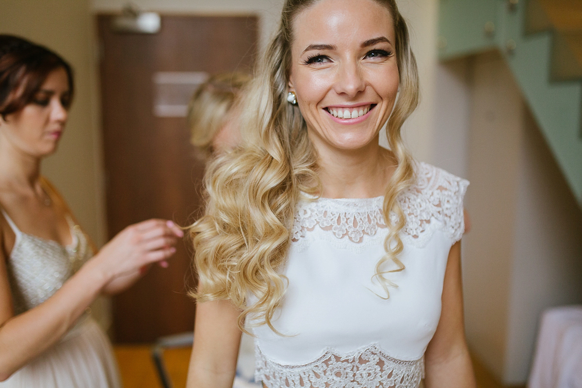 Emma wore Rime Aradaky separates and a polka dot veil by Luna Bea, for her fun, relaxed and cool East London wedding at MC Motors in Dalston. Photography by Emma & Pete.