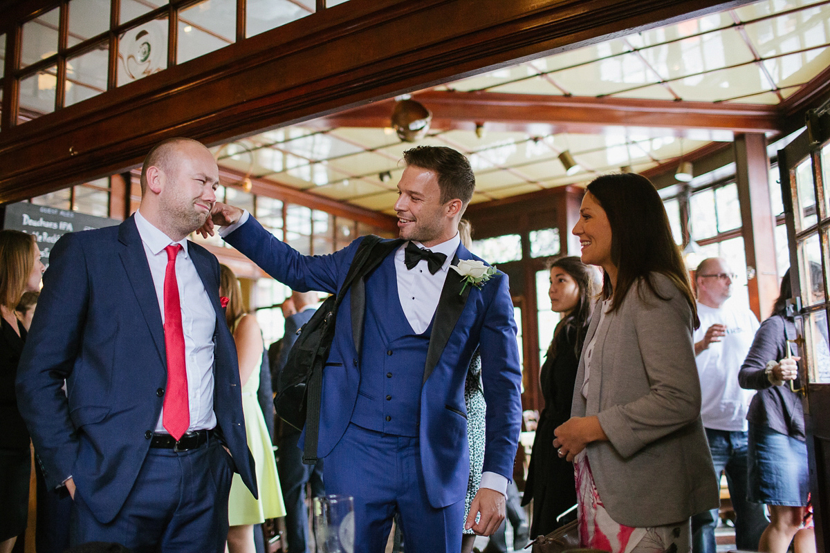 Emma wore Rime Aradaky separates and a polka dot veil by Luna Bea, for her fun, relaxed and cool East London wedding at MC Motors in Dalston. Photography by Emma & Pete.