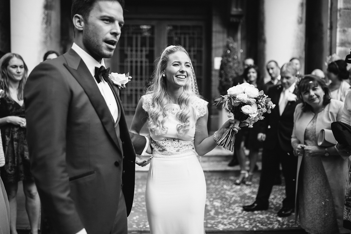 Emma wore Rime Aradaky separates and a polka dot veil by Luna Bea, for her fun, relaxed and cool East London wedding at MC Motors in Dalston. Photography by Emma & Pete.