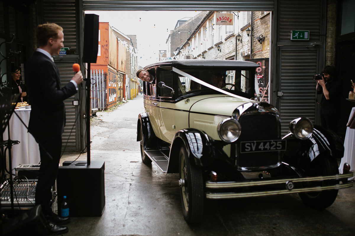 Emma wore Rime Aradaky separates and a polka dot veil by Luna Bea, for her fun, relaxed and cool East London wedding at MC Motors in Dalston. Photography by Emma & Pete.