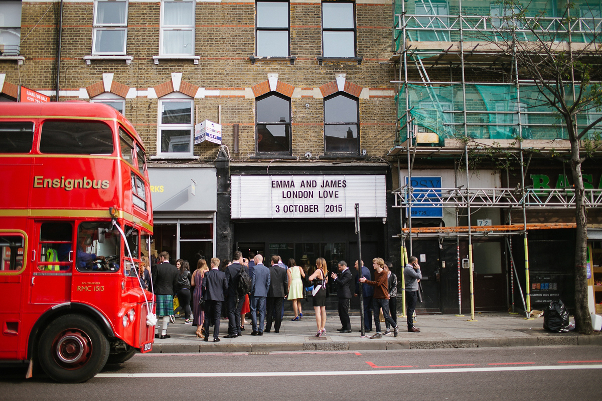 Emma wore Rime Aradaky separates and a polka dot veil by Luna Bea, for her fun, relaxed and cool East London wedding at MC Motors in Dalston. Photography by Emma & Pete.