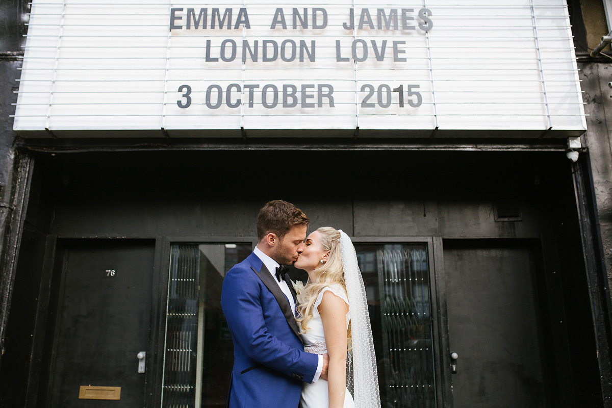 Emma wore Rime Aradaky separates and a polka dot veil by Luna Bea, for her fun, relaxed and cool East London wedding at MC Motors in Dalston. Photography by Emma & Pete.