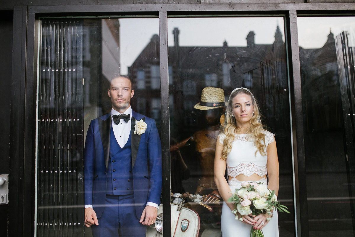 Emma wore Rime Aradaky separates and a polka dot veil by Luna Bea, for her fun, relaxed and cool East London wedding at MC Motors in Dalston. Photography by Emma & Pete.