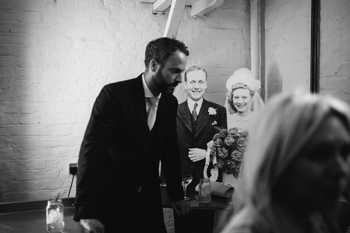 Emma wore Rime Aradaky separates and a polka dot veil by Luna Bea, for her fun, relaxed and cool East London wedding at MC Motors in Dalston. Photography by Emma & Pete.