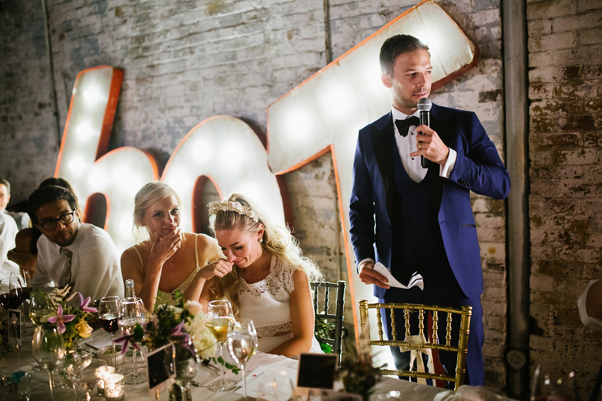 Emma wore Rime Aradaky separates and a polka dot veil by Luna Bea, for her fun, relaxed and cool East London wedding at MC Motors in Dalston. Photography by Emma & Pete.