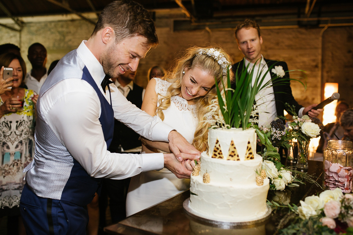 Emma wore Rime Aradaky separates and a polka dot veil by Luna Bea, for her fun, relaxed and cool East London wedding at MC Motors in Dalston. Photography by Emma & Pete.