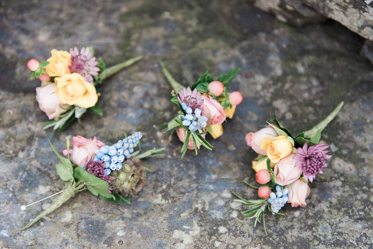 Suzi wears a Yolancris dress and flower crown for her rustic, intimate wedding in the Lake District. Photography by Sarah Folega.