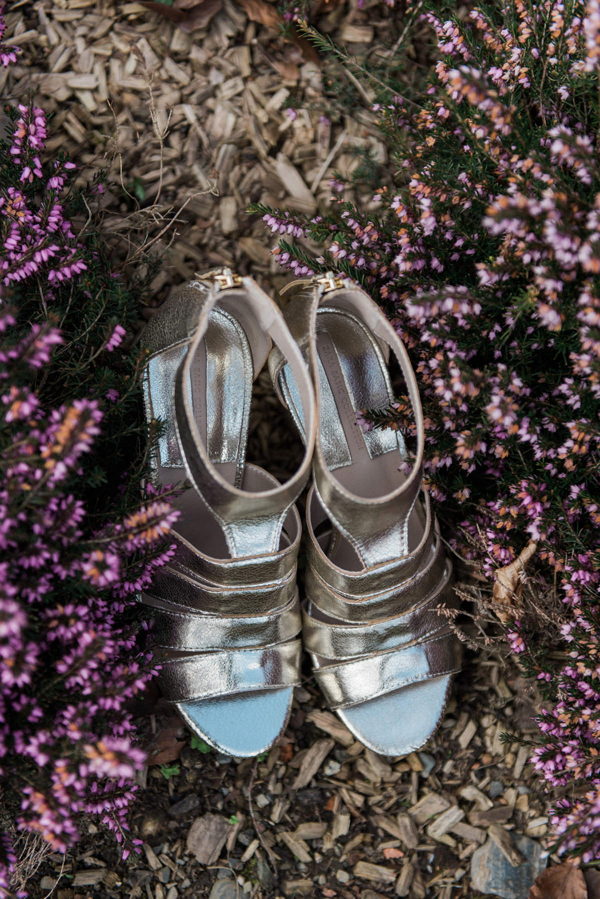 Suzi wears a Yolancris dress and flower crown for her rustic, intimate wedding in the Lake District. Photography by Sarah Folega.