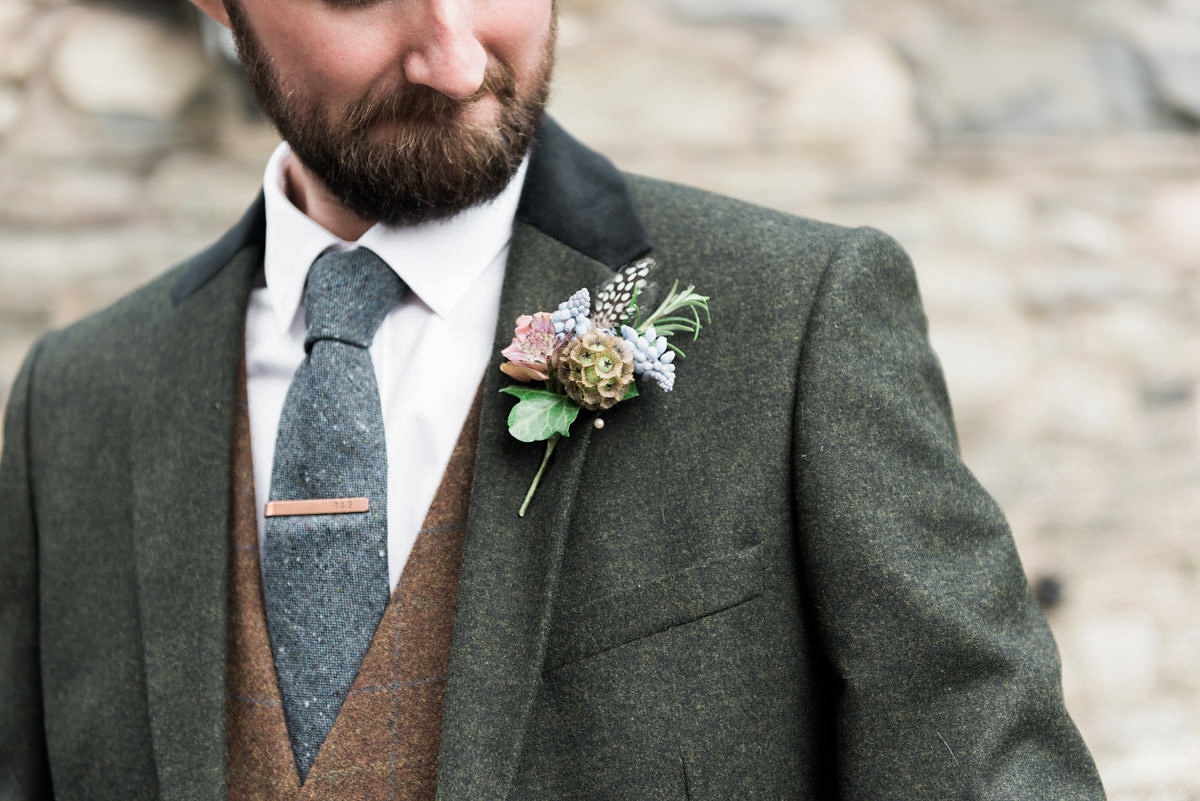 Suzi wears a Yolancris dress and flower crown for her rustic, intimate wedding in the Lake District. Photography by Sarah Folega.