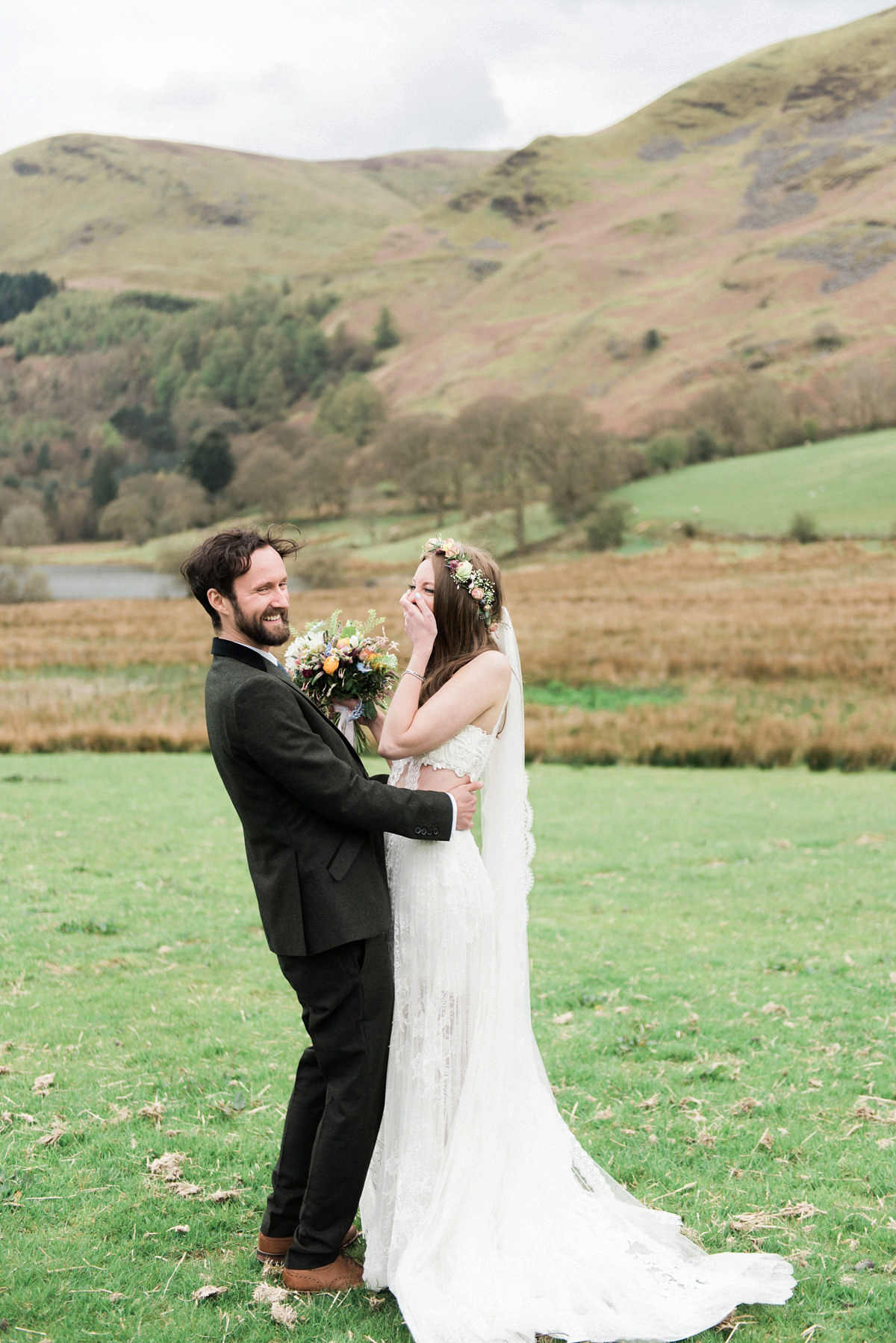 Suzi wears a Yolancris dress and flower crown for her rustic, intimate wedding in the Lake District. Photography by Sarah Folega.