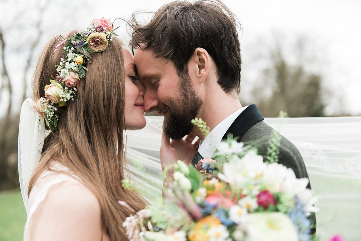 Suzi wears a Yolancris dress and flower crown for her rustic, intimate wedding in the Lake District. Photography by Sarah Folega.