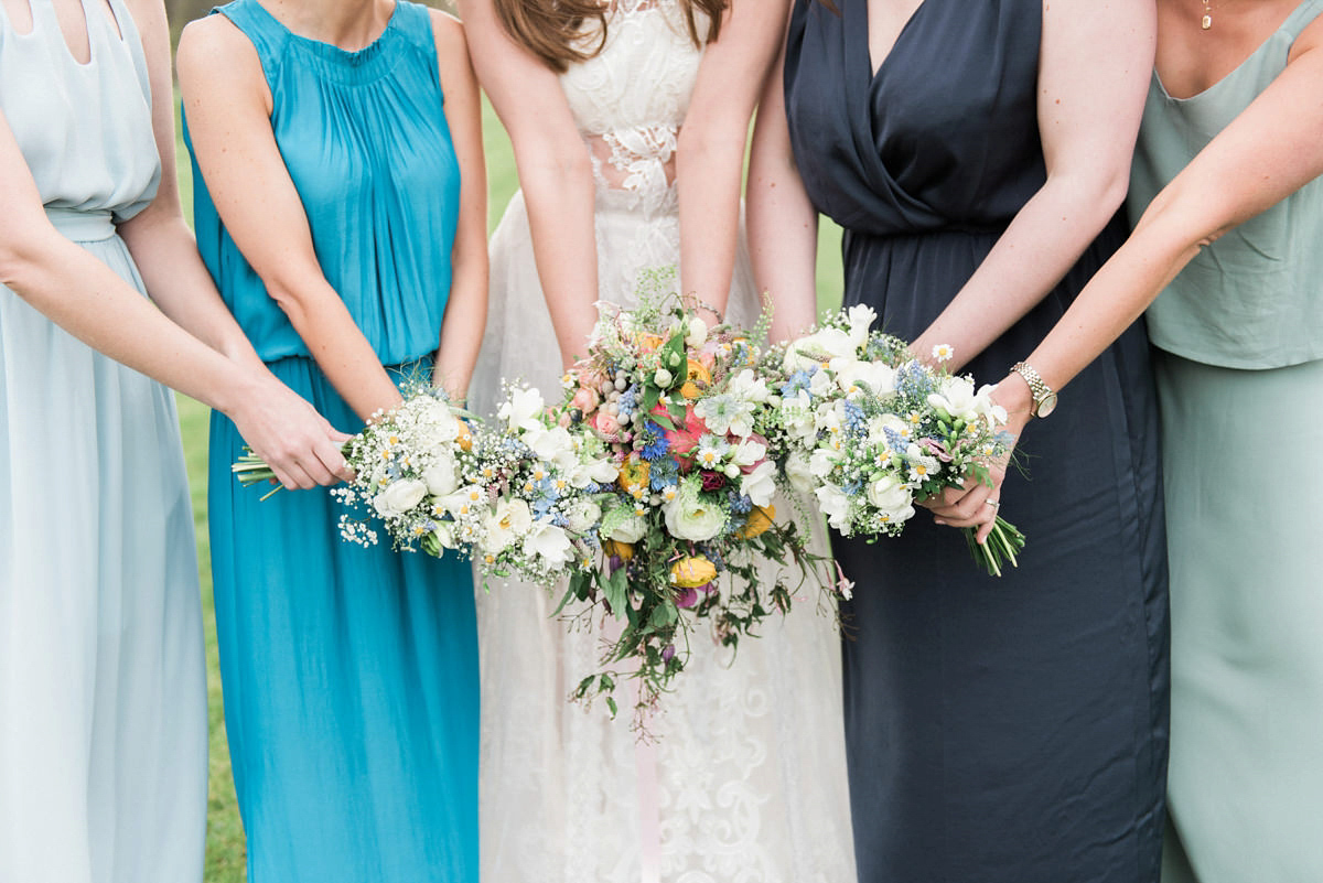 Suzi wears a Yolancris dress and flower crown for her rustic, intimate wedding in the Lake District. Photography by Sarah Folega.