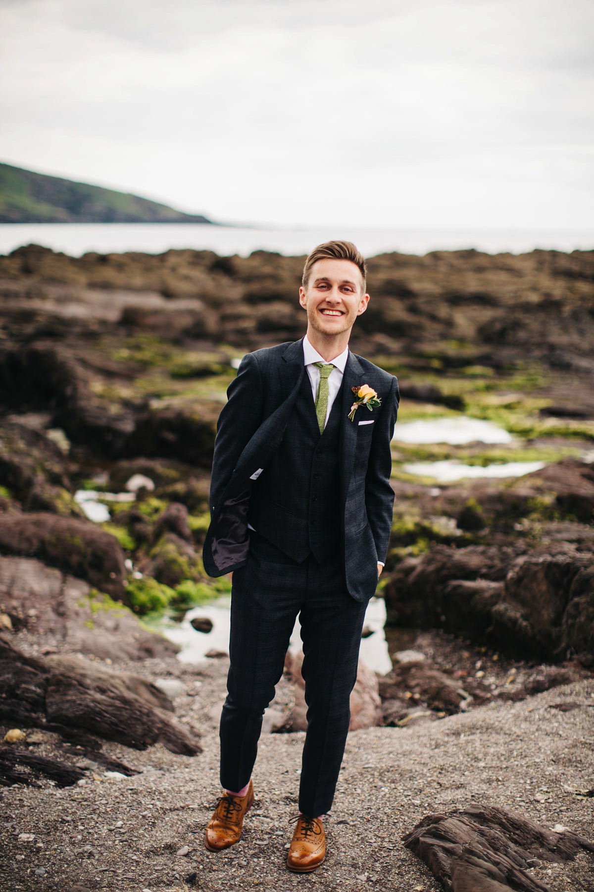 Boho bride Alice wore a pale green lace wedding dress and floral crown for her wild woodland inspired, free spirited South Devon wedding at Langdon Court. Photography by Richard Skins.