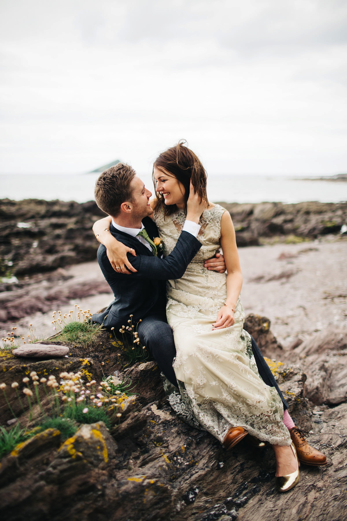 Boho bride Alice wore a pale green lace wedding dress and floral crown for her wild woodland inspired, free spirited South Devon wedding at Langdon Court. Photography by Richard Skins.