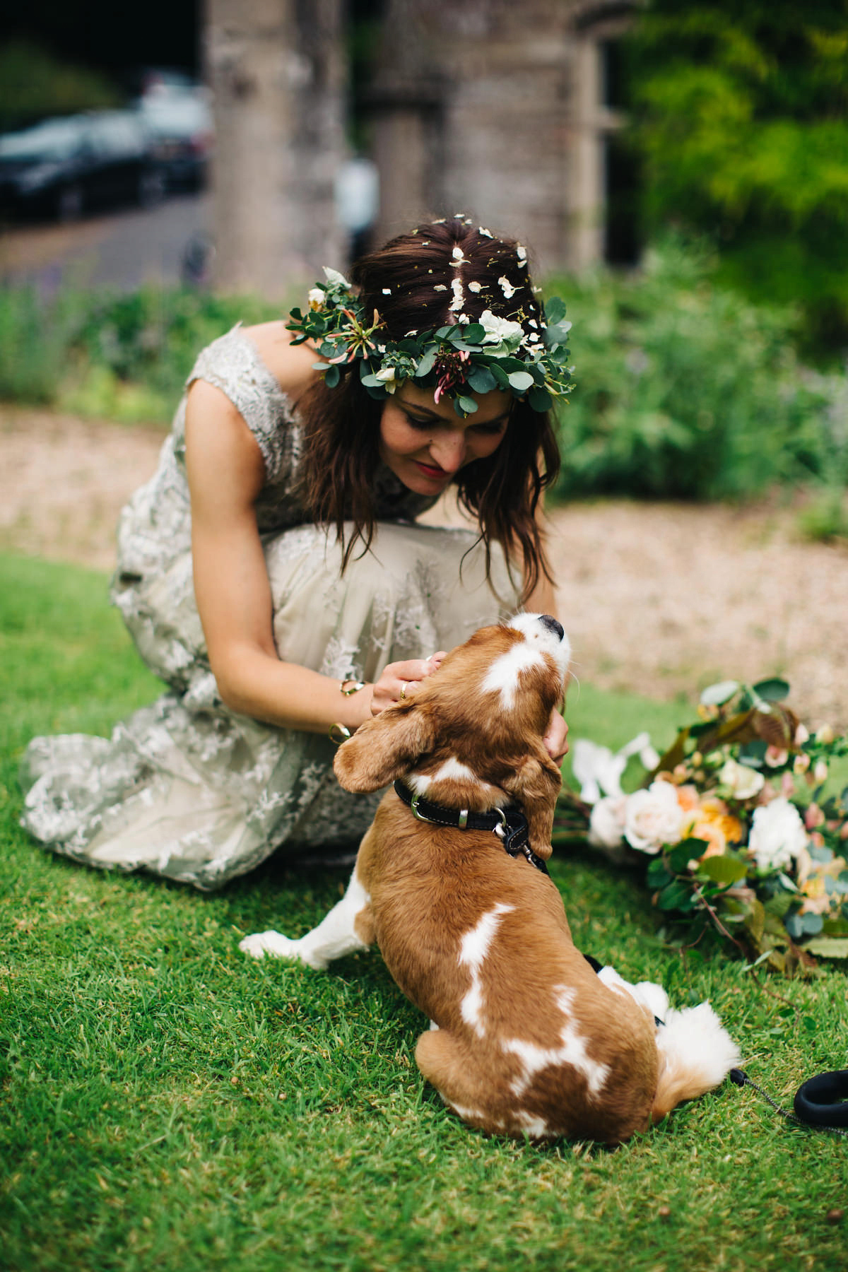 Boho bride Alice wore a pale green lace wedding dress and floral crown for her wild woodland inspired, free spirited South Devon wedding at Langdon Court. Photography by Richard Skins.