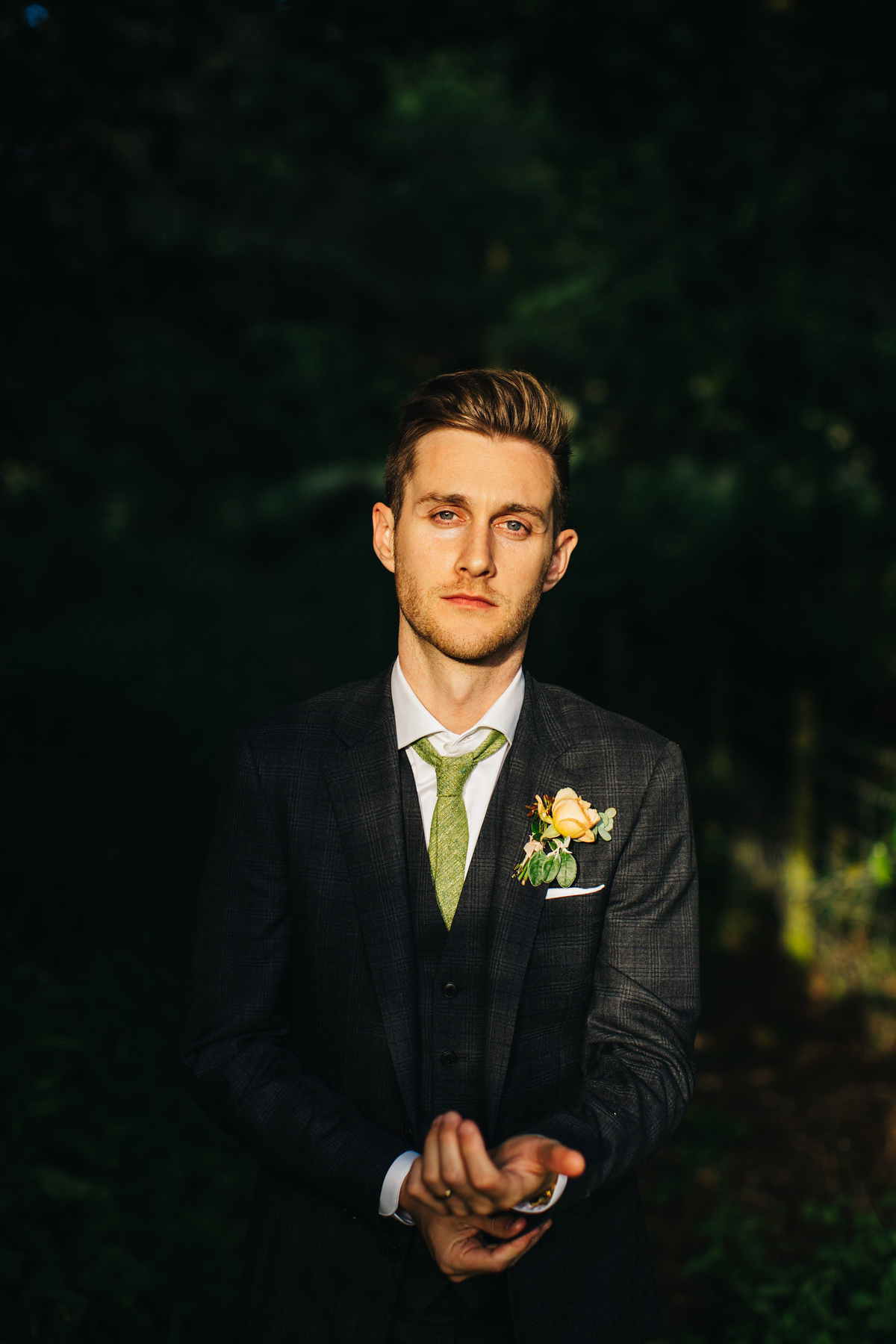 Boho bride Alice wore a pale green lace wedding dress and floral crown for her wild woodland inspired, free spirited South Devon wedding at Langdon Court. Photography by Richard Skins.