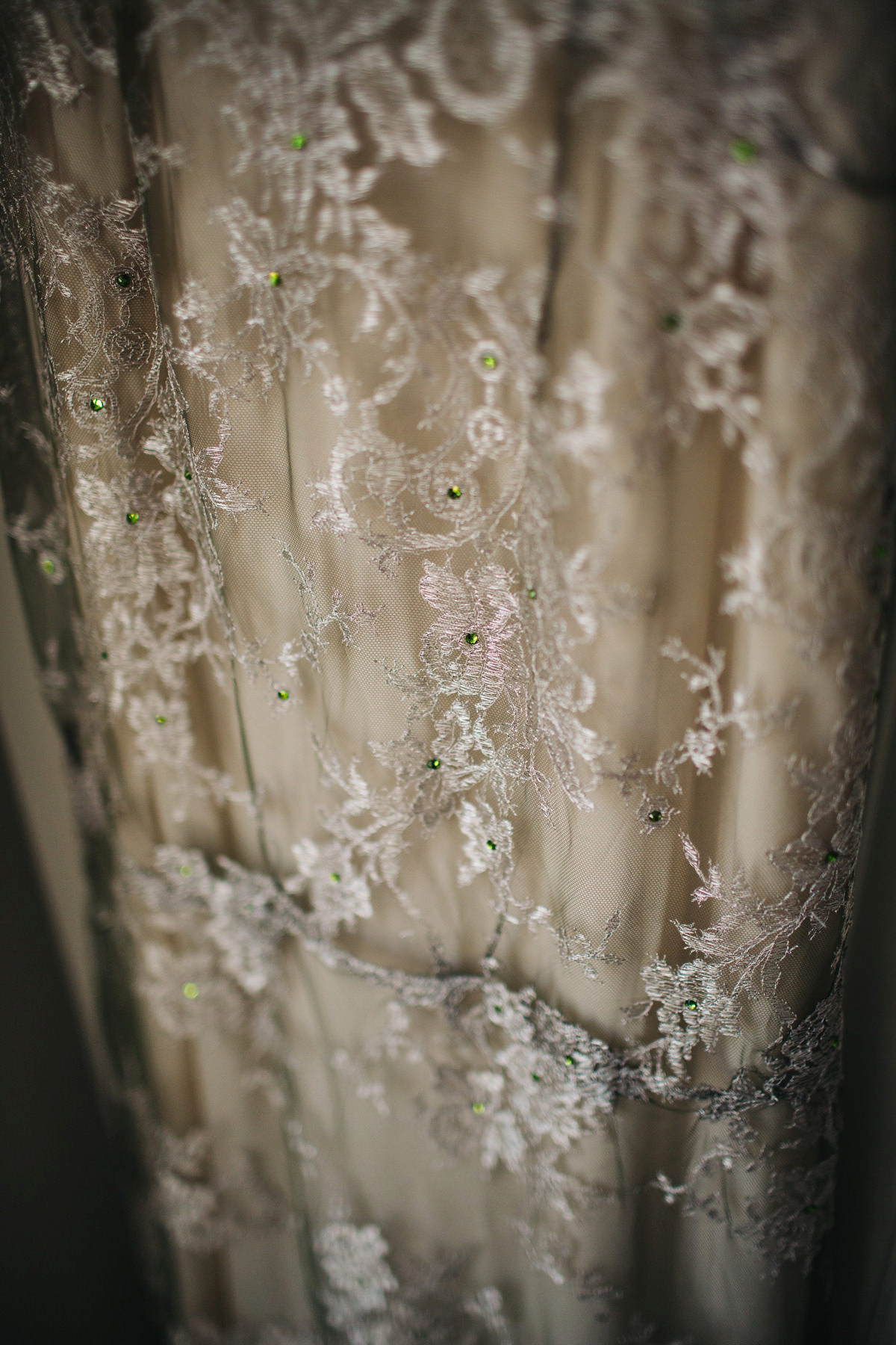 Boho bride Alice wore a pale green lace wedding dress and floral crown for her wild woodland inspired, free spirited South Devon wedding at Langdon Court. Photography by Richard Skins.