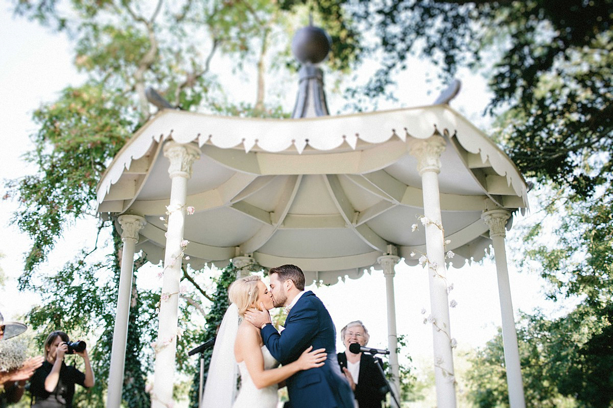 Lauren wore an Enzoani gown and a fishtail braid for her pretty, pastel colour Autumn wedding at Preston Court. Photography by Jacob & Pauline.