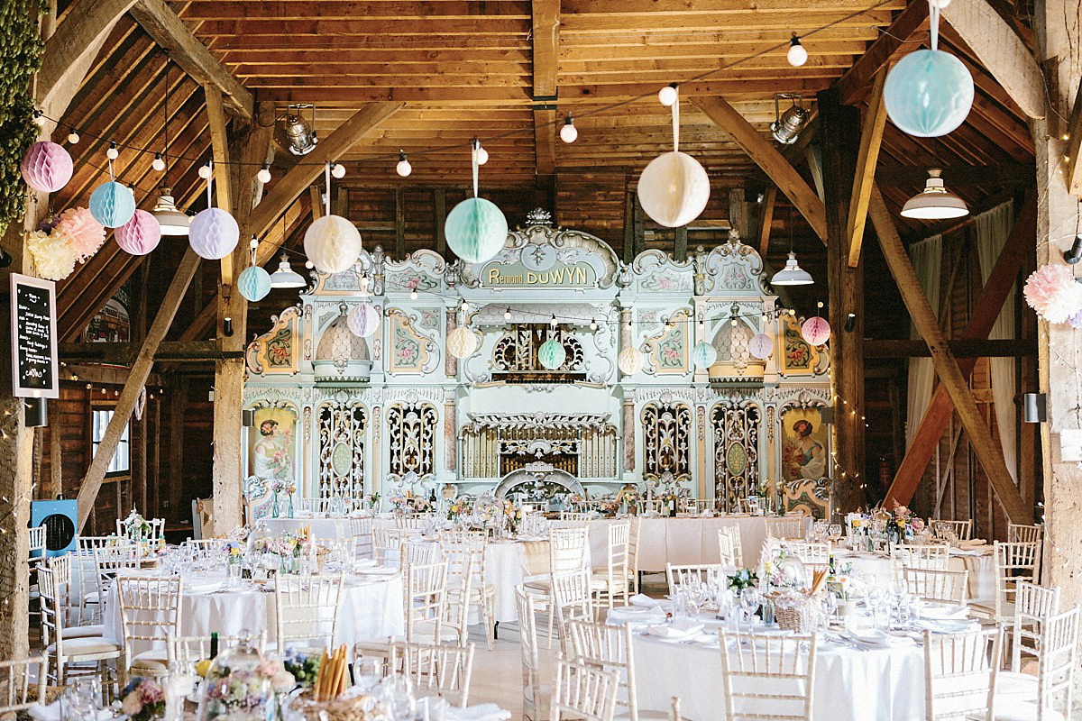 Lauren wore an Enzoani gown and a fishtail braid for her pretty, pastel colour Autumn wedding at Preston Court. Photography by Jacob & Pauline.