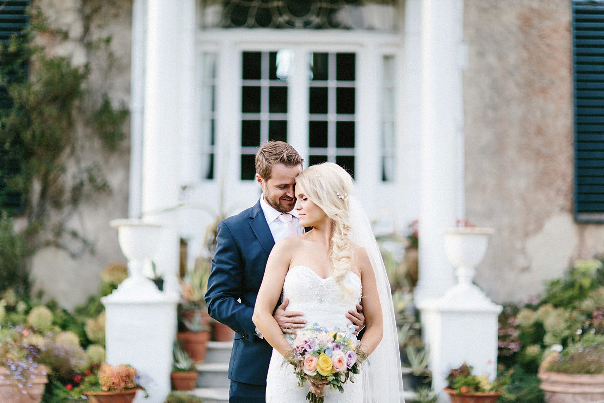 Lauren wore an Enzoani gown and a fishtail braid for her pretty, pastel colour Autumn wedding at Preston Court. Photography by Jacob & Pauline.