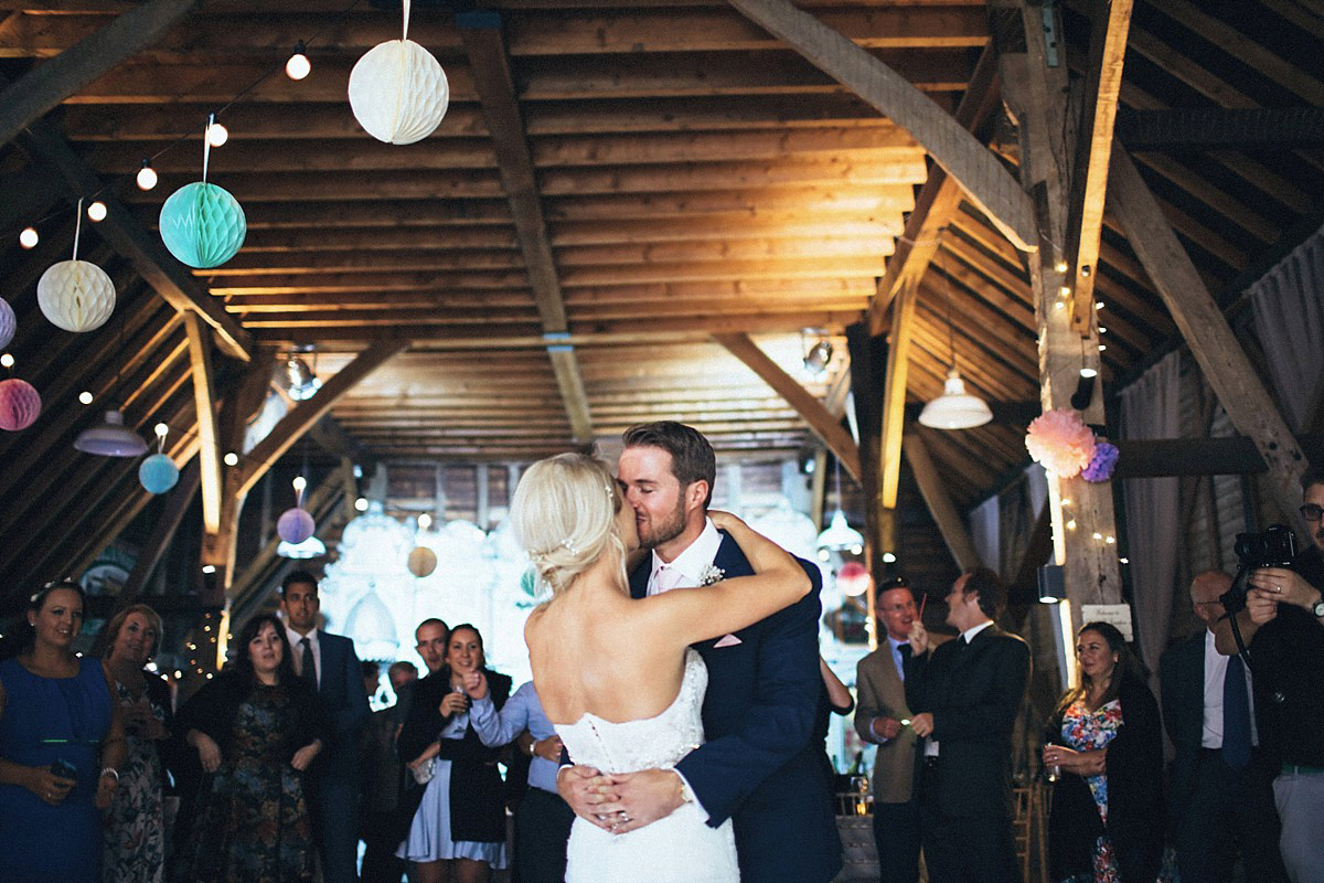 Lauren wore an Enzoani gown and a fishtail braid for her pretty, pastel colour Autumn wedding at Preston Court. Photography by Jacob & Pauline.