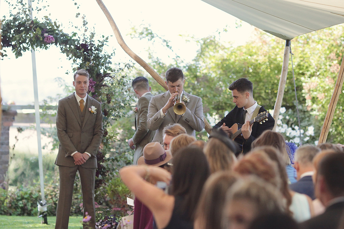 Ellie's wears a 1920's drop waist vintage dress for her outdoor, Autumn, Humanist wedding ceremony at Dewsall Court. Images by Bullit Photography.