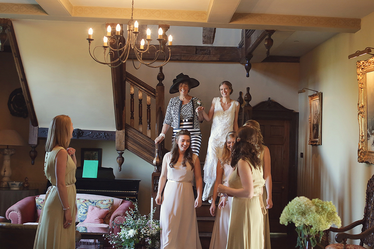 Ellie's wears a 1920's drop waist vintage dress for her outdoor, Autumn, Humanist wedding ceremony at Dewsall Court. Images by Bullit Photography.