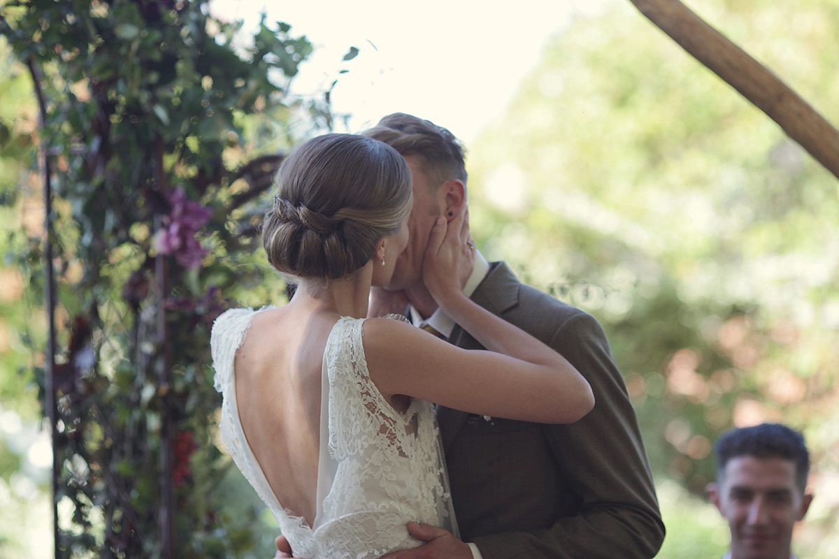 Ellie's wears a 1920's drop waist vintage dress for her outdoor, Autumn, Humanist wedding ceremony at Dewsall Court. Images by Bullit Photography.