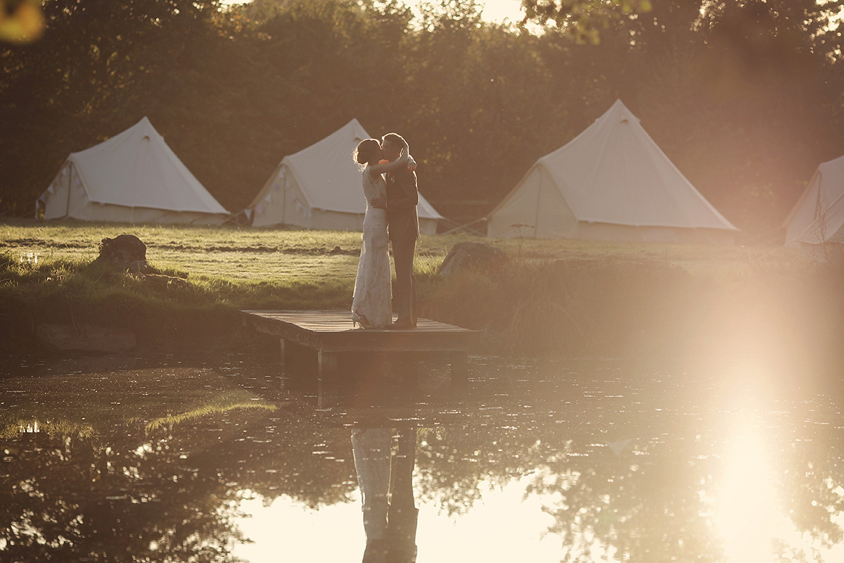 Ellie's wears a 1920's drop waist vintage dress for her outdoor, Autumn, Humanist wedding ceremony at Dewsall Court. Images by Bullit Photography.