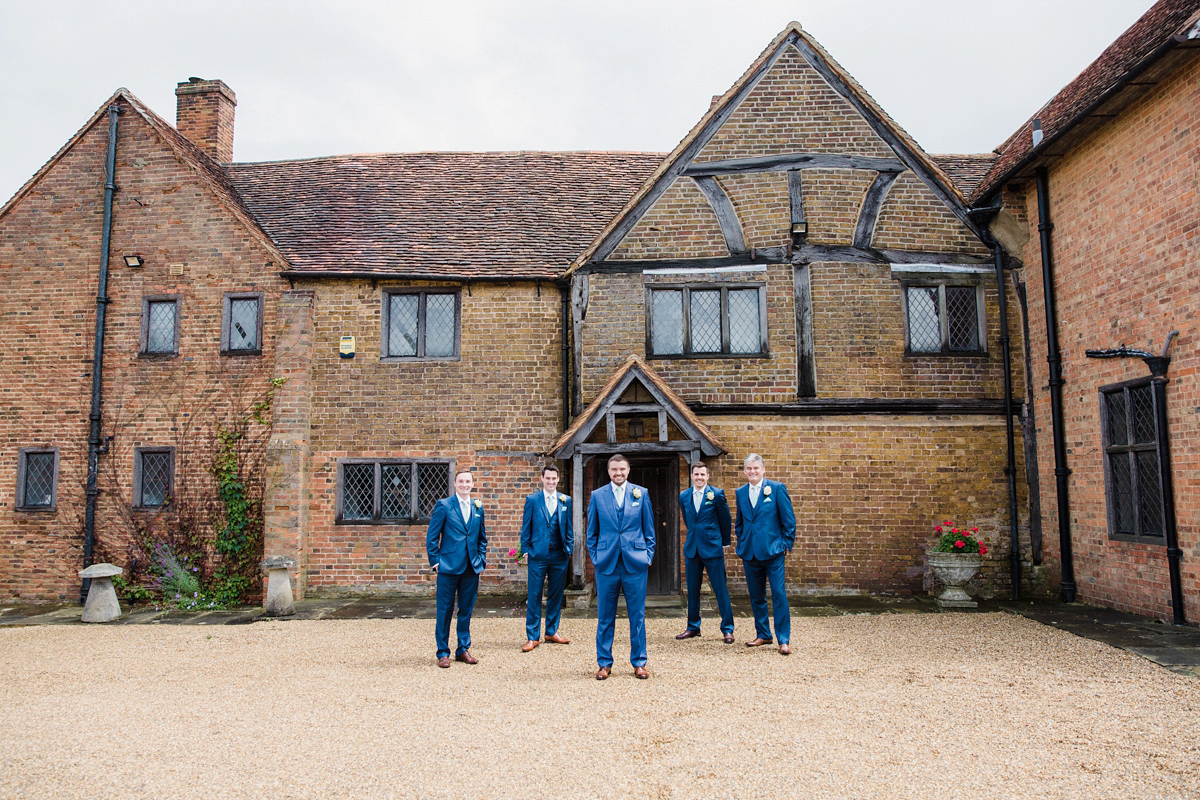 Liz wore a Vivienne Westwood dress for her hot air balloon and travel inspired wedding ('Around the World in 80 Days', Phileas Fogg style). A Lillibrooke Hall summer barn wedding, photographed by Faye Cornhill.