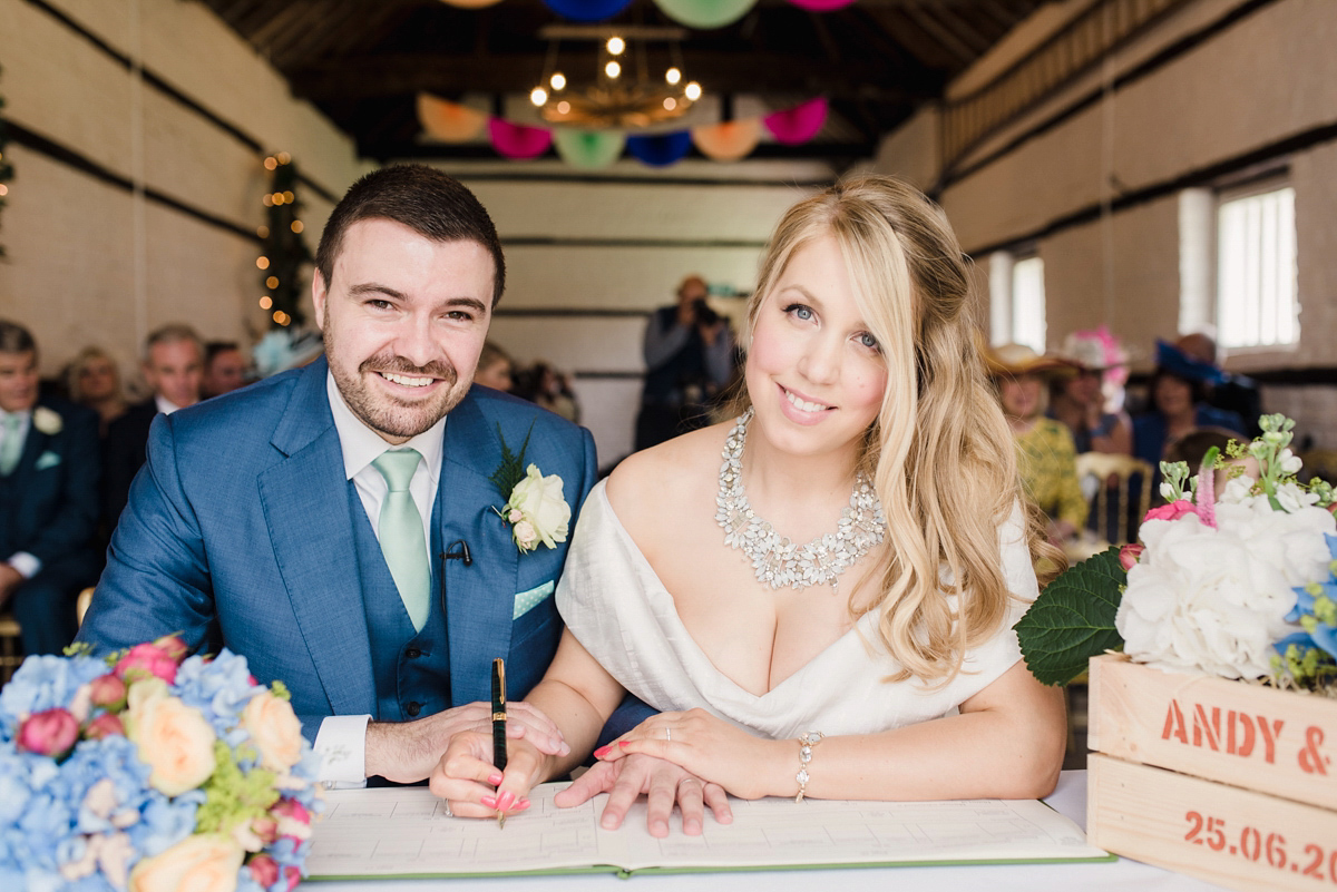 Liz wore a Vivienne Westwood dress for her hot air balloon and travel inspired wedding ('Around the World in 80 Days', Phileas Fogg style). A Lillibrooke Hall summer barn wedding, photographed by Faye Cornhill.