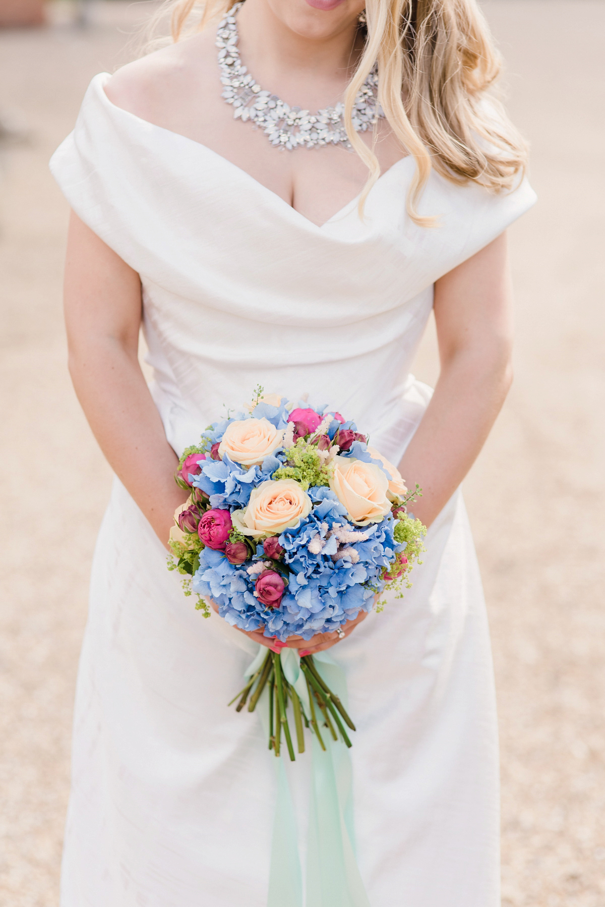 Liz wore a Vivienne Westwood dress for her hot air balloon and travel inspired wedding ('Around the World in 80 Days', Phileas Fogg style). A Lillibrooke Hall summer barn wedding, photographed by Faye Cornhill.