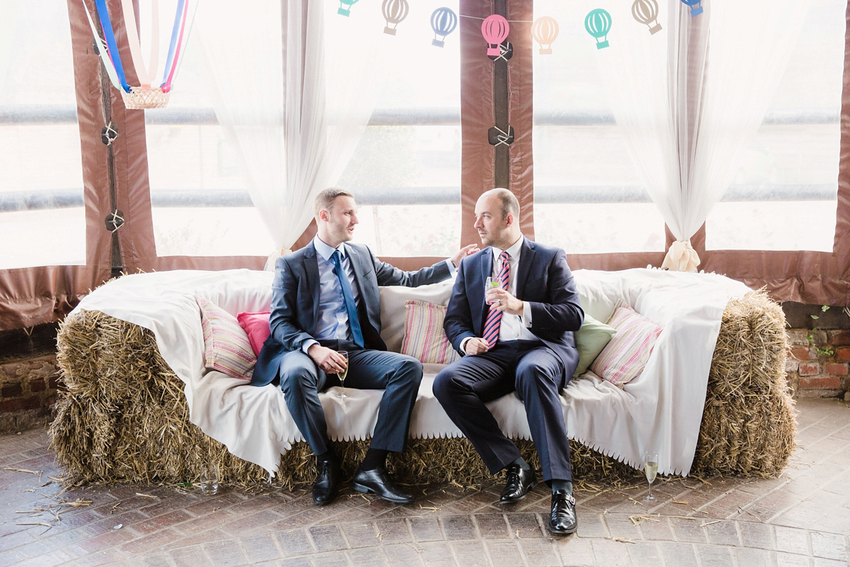 Liz wore a Vivienne Westwood dress for her hot air balloon and travel inspired wedding ('Around the World in 80 Days', Phileas Fogg style). A Lillibrooke Hall summer barn wedding, photographed by Faye Cornhill.