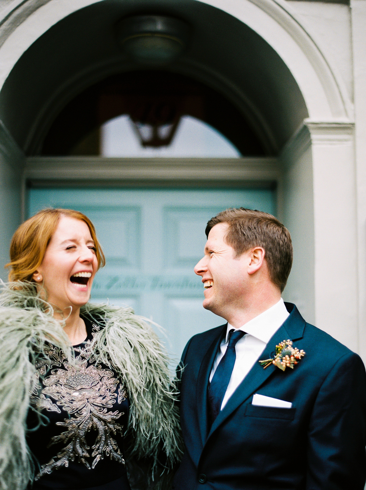 Leanne wears a navy blue Alexander McQueen dress for her modern and stylish, non traditional London wedding. A First look wedding captured on film by Peachey Photography.