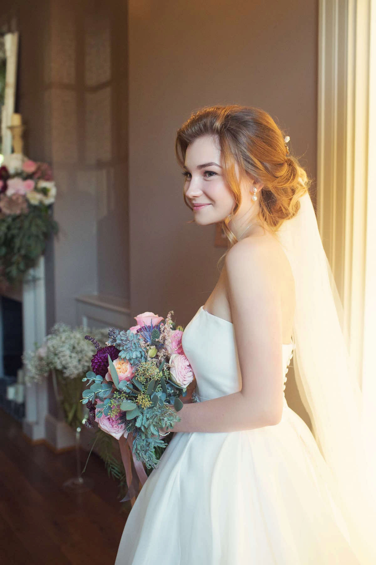 Anastasia wore a Jesus Peiro gown and Badgley Mischka shoes for her feminine, romantic and elegant country house wedding in Autumn.